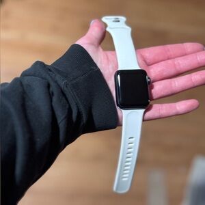 Series 3 Black Apple Watch with 38/40mm white apple silicone band